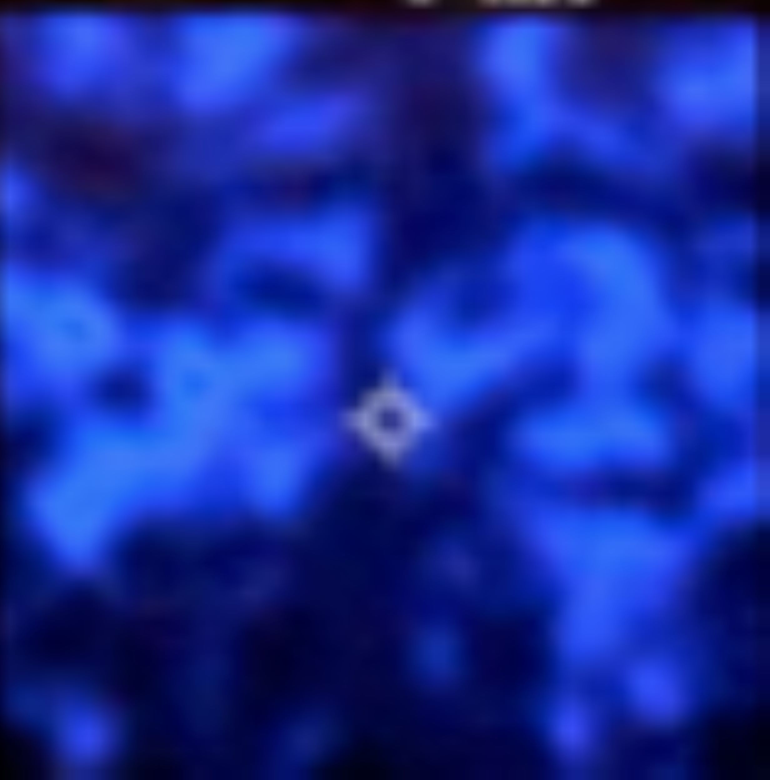 Thermal imaging footage of a mottled blue background with a small ring-shaped anomaly marked by a targeting reticle