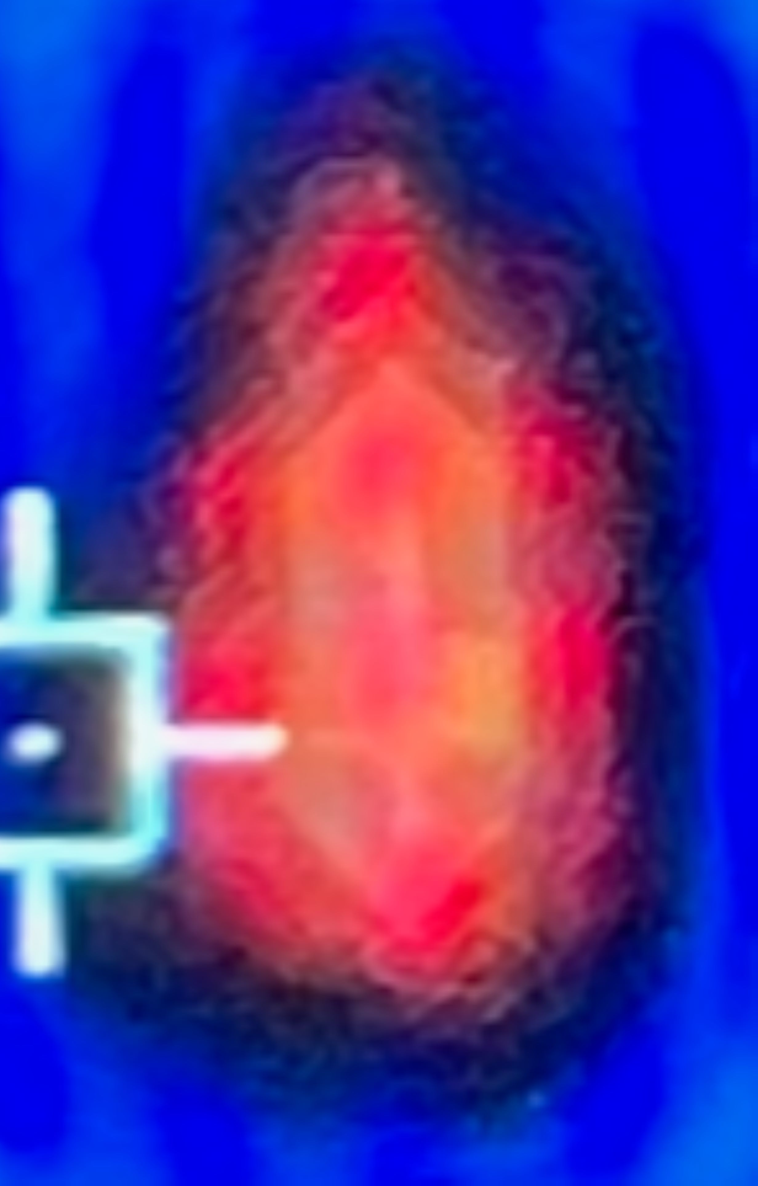 Thermal imaging close-up of a glowing red and orange elongated heat signature marked with a targeting reticle